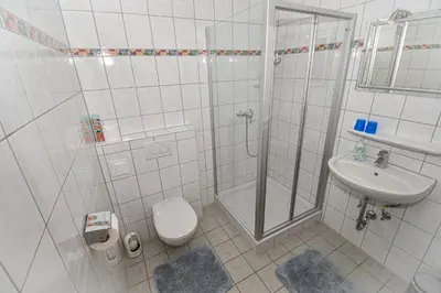 Ein Badezimmer in der Unterkunft Pension Schachner