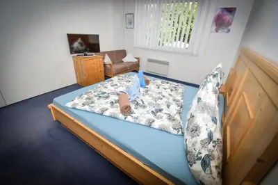 Ein Bett oder Betten in einem Zimmer der Unterkunft Pension Schachner