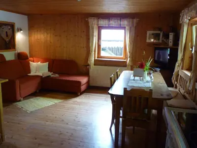 Ein Sitzbereich in der Unterkunft Fenzhof