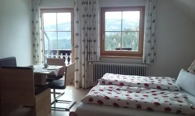 Ein Bett oder Betten in einem Zimmer der Unterkunft Ferienwohnungen Bachergut