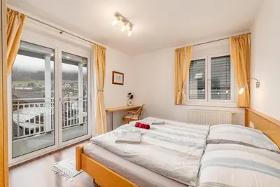 Ein Bett oder Betten in einem Zimmer der Unterkunft Schladminger-Tor Apartment - by myNests