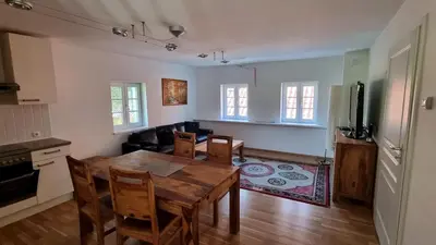 Ein Sitzbereich in der Unterkunft Ferienhaus mit Bergblick auf die Kremsmauer - ruhig und hundefreundlich