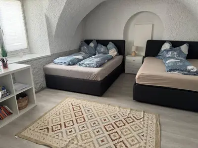 Ein Bett oder Betten in einem Zimmer der Unterkunft Ferienwohnung Liolina Irdning