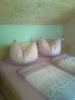 Ein Bett oder Betten in einem Zimmer der Unterkunft Appartement Landhaus Stierer
