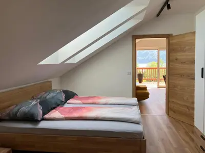 Ein Bett oder Betten in einem Zimmer der Unterkunft Sunset am Attersee