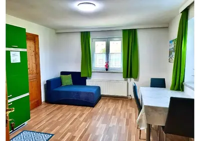 Ein Sitzbereich in der Unterkunft Apartments Enser , Gampern