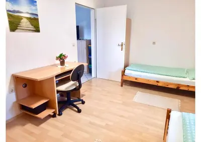 Ein Bett oder Betten in einem Zimmer der Unterkunft Apartments Enser