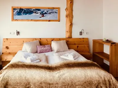 Ein Bett oder Betten in einem Zimmer der Unterkunft Lodge am Krippenstein