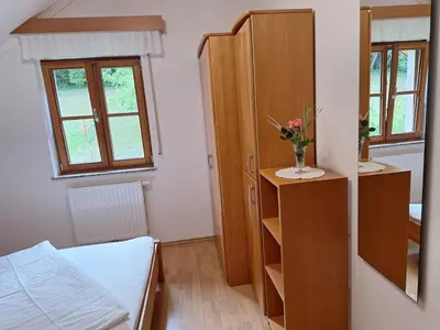 Ein Bett oder Betten in einem Zimmer der Unterkunft Privatzimmer am Weinbrunnen