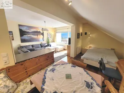 Ein Bett oder Betten in einem Zimmer der Unterkunft Apartment Abendrot by FiS - Fun in Styria