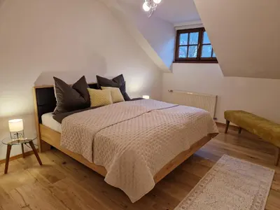 Ein Bett oder Betten in einem Zimmer der Unterkunft Ferienwohnung im Schlosshof