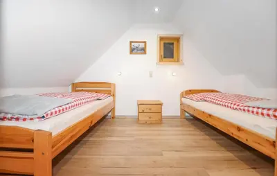 Ein Bett oder Betten in einem Zimmer der Unterkunft Ferienhaus Mit Sauna