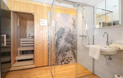 Ein Badezimmer in der Unterkunft Ferienhaus Mit Sauna