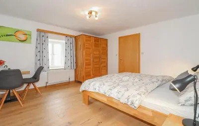 Ein Bett oder Betten in einem Zimmer der Unterkunft Ferienwohnung In Sankt Koloman
