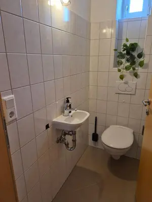 Ein Badezimmer in der Unterkunft Apartment West