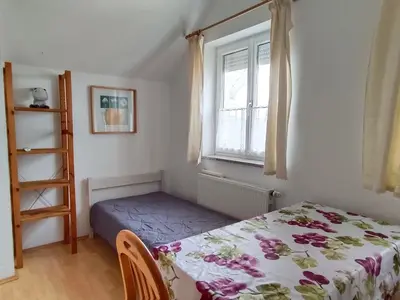 Ein Bett oder Betten in einem Zimmer der Unterkunft Apartment-DGW