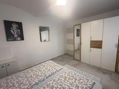 Ein Bett oder Betten in einem Zimmer der Unterkunft Luxus Apartment - Toskana Gasthaus