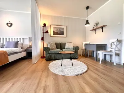 Ein Bett oder Betten in einem Zimmer der Unterkunft Gosau Apartment 202