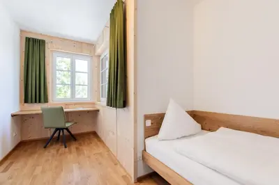 Ein Bett oder Betten in einem Zimmer der Unterkunft Dachstein Residenzen