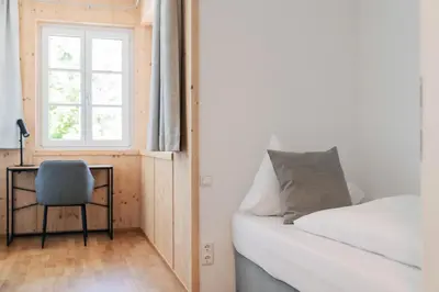 Ein Bett oder Betten in einem Zimmer der Unterkunft Dachstein Residenzen