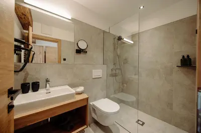 Ein Badezimmer in der Unterkunft JUMA alpine living