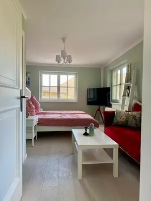 Ein Bett oder Betten in einem Zimmer der Unterkunft LIVA LIVING, Apartments mit Berg- und Seeblick, große Terrassen