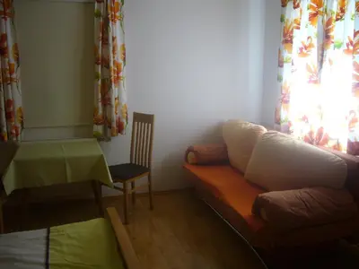 Ein Sitzbereich in der Unterkunft Ferienhof Fischenhaus
