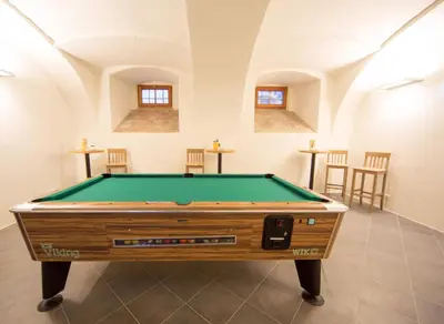 Ein Billardtisch in der Unterkunft JUFA Hotel Spital am Pyhrn