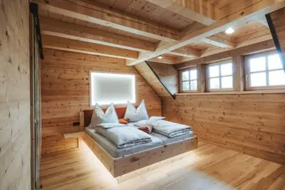 Ein Bett oder Betten in einem Zimmer der Unterkunft Mariandl Alm