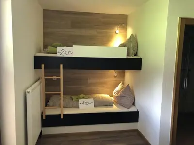 Ein Bett oder Betten in einem Zimmer der Unterkunft Haus Obertiefenbach