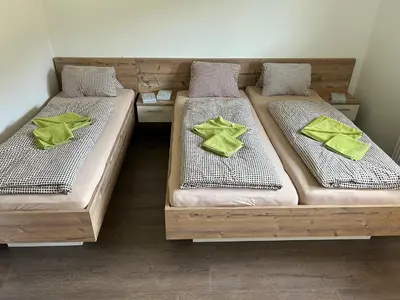 Ein Bett oder Betten in einem Zimmer der Unterkunft Haus Obertiefenbach
