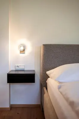 Ein Bett oder Betten in einem Zimmer der Unterkunft Panorama Mountain & Castle View Apartment D'Fidlerin Salzburg