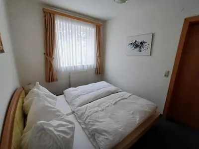 Ein Bett oder Betten in einem Zimmer der Unterkunft Alpendorf, Austria