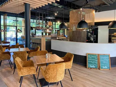 Ein Restaurant oder anderes Speiselokal in der Unterkunft Campingresort Hinterstoder