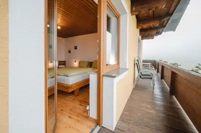 Ein Bett oder Betten in einem Zimmer der Unterkunft Mooshof