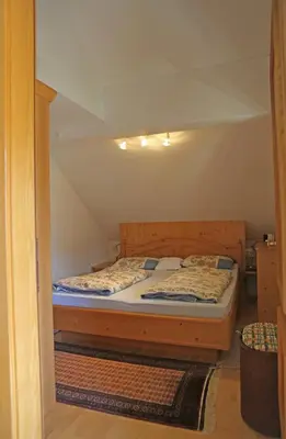Ein Bett oder Betten in einem Zimmer der Unterkunft Appartementhaus Wehrenfennig