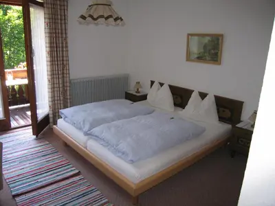 Ein Bett oder Betten in einem Zimmer der Unterkunft Gästehaus Sonnenwinkel - Villa Rösler