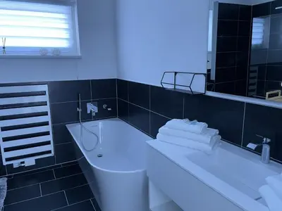 Ein Badezimmer in der Unterkunft Bungalow KONI