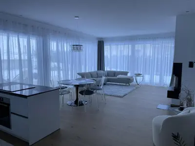 Ein Sitzbereich in der Unterkunft Bungalow KONI