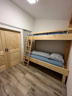 Ein Bett oder Betten in einem Zimmer der Unterkunft Bio-Bergbauernhof Lasserbauer