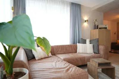 Ein Sitzbereich in der Unterkunft Appartement Am-Wildpfad