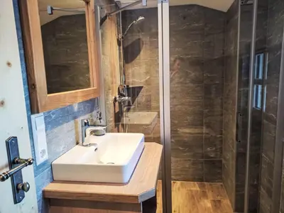 Ein Badezimmer in der Unterkunft Apartment Dachsteinblick by Interhome