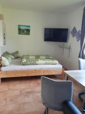 Ein Bett oder Betten in einem Zimmer der Unterkunft E-Bike Unterkunft Eder