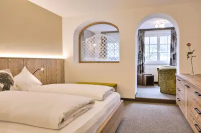 Ein Bett oder Betten in einem Zimmer der Unterkunft Hotel Sommerhof