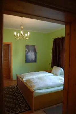 Ein Bett oder Betten in einem Zimmer der Unterkunft Ferienwohnungen Primoschitz