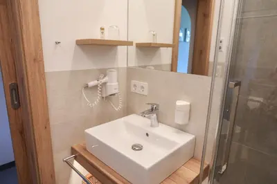 Ein Badezimmer in der Unterkunft Pension Strobl