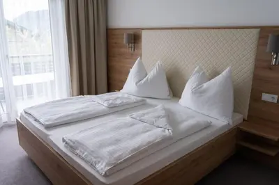 Ein Bett oder Betten in einem Zimmer der Unterkunft Pension Strobl
