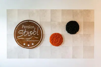 Ein Zertifikat, Auszeichnung, Logo oder anderes Dokument, das in der Unterkunft Pension Strobl ausgestellt ist