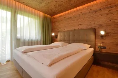 Ein Bett oder Betten in einem Zimmer der Unterkunft Landhotel Gressenbauer