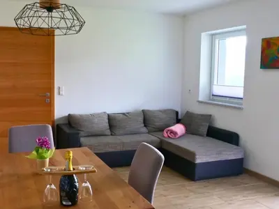 Ein Sitzbereich in der Unterkunft Apartment Rosa